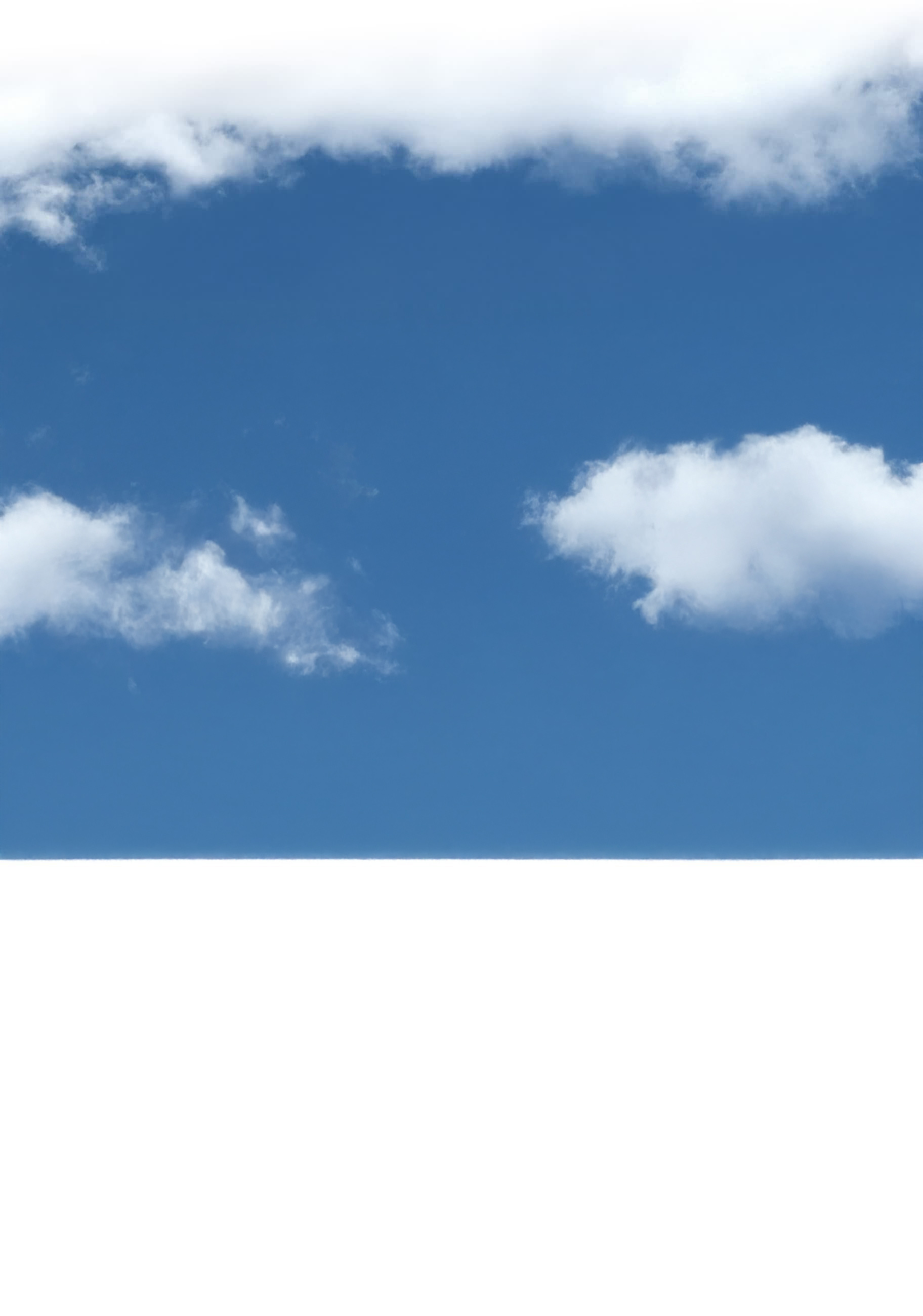 Wolkenhintergrund hinter unserer Reetkate